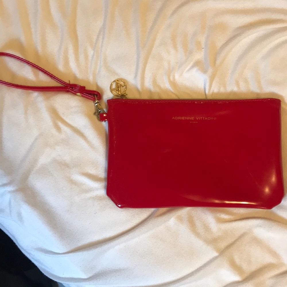Charging red wristlet or clutch!